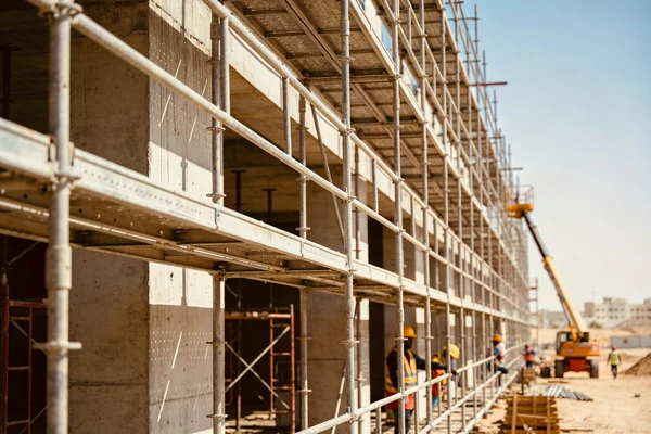 Construction scaffolding on commercial project in Oman