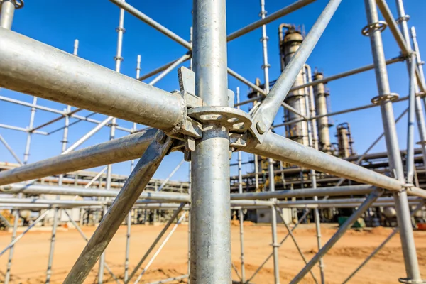 Cuplock scaffolding on industrial site in Oman