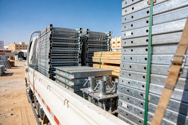 Scaffolding materials loading on flatbed truck